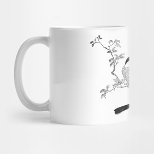 Two birds on a branch. Mug